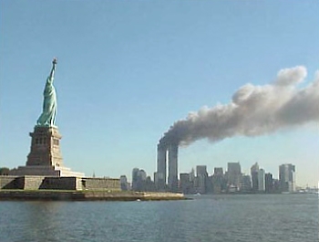 The Statue of Liberty and the twin towers of the World Trade Center on September 11, 2001.