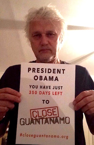 The musician David Knopfler supports the new Countdown to Close Guantanamo campaign, and stands with a poster telling President Obama that, on February 4, 2016, he has just 350 days left to close Guantanamo before he leaves office.