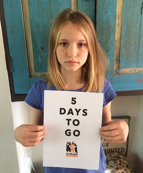 Malila Durant, daughter of We Stand With Shaker co-director Joanne MacInnes, stands with a poster marking the countdown to the hoped-for release of Shaker Aamer from Guantanamo on October 25.