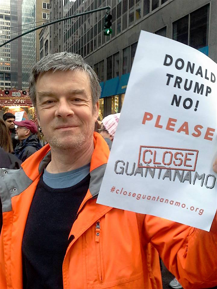 Andy Worthington calls on Donald Trump to close Guantanamo on his first full day in office, Jan. 21, 2017, during the massive women's march against his presidency in New York City.