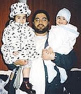 Shaker Aamer and two of his four children