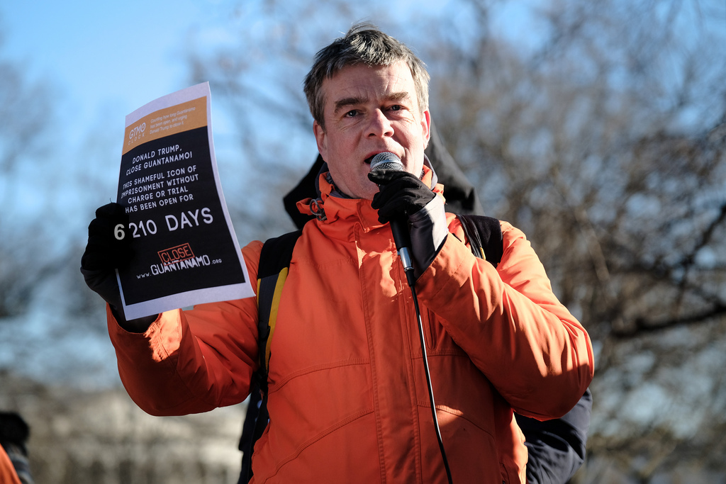 Andy Worthington photographed outside the White House calling for the closure of Guantanamo on January 11, 2019, the 17th anniversary of the opening of the prison; or, to put it another way, when it had been open for 6,210 days (Photo: Steve Pavey for Witness Against Torture).