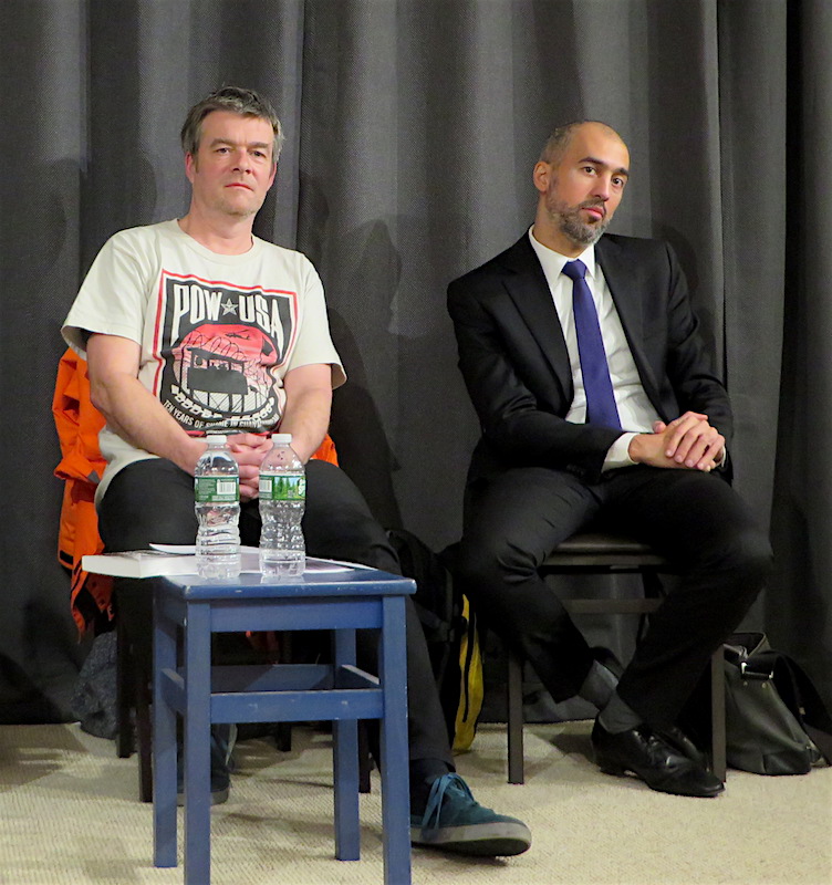 Andy Worthington and Ramzi Kassem listening to a question from the audience at a discussion about Guantanamo at Revolution Books on January 13, 2017.