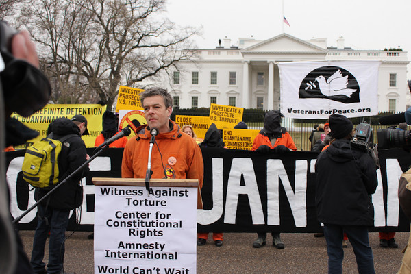 Andy Worthington calls on President Obama to close Guantanamo at a rally outside The White House on January 11, 2011 (Photo by Sarah K. Hogarth).