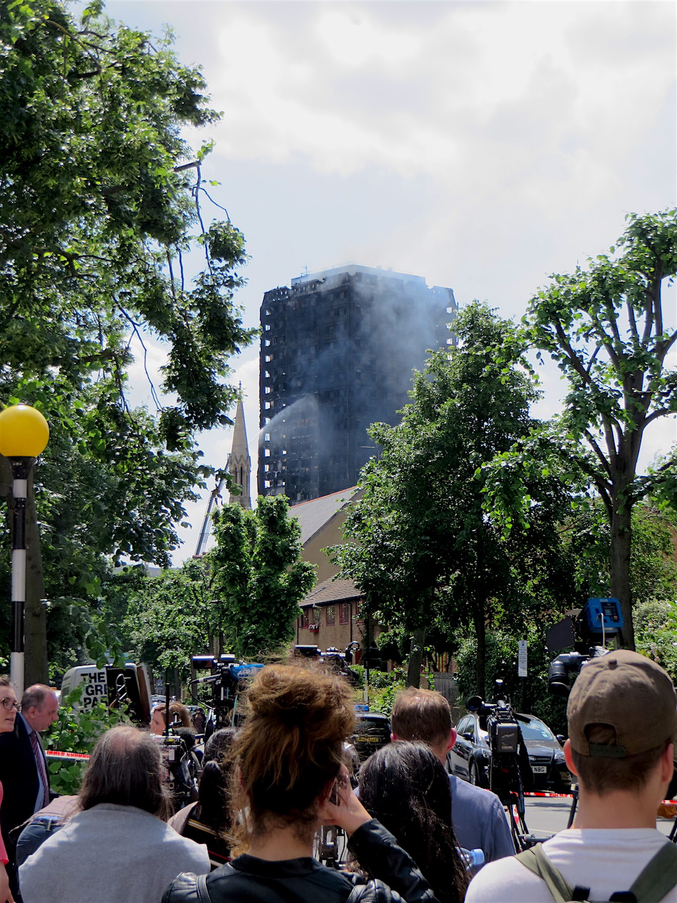 Grenfell Tower, photographed on the afternoon of June 14, 2017, about 12 hours after the inferno began (Photo: Andy Worthington).