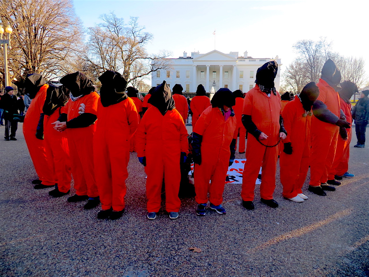 Witness Against Torture campaigners form a circle outside the White House towards the end of the annual vigil calling for the closure of Guantanamo, on January 11, 2019 (Photo: Andy Worthington).