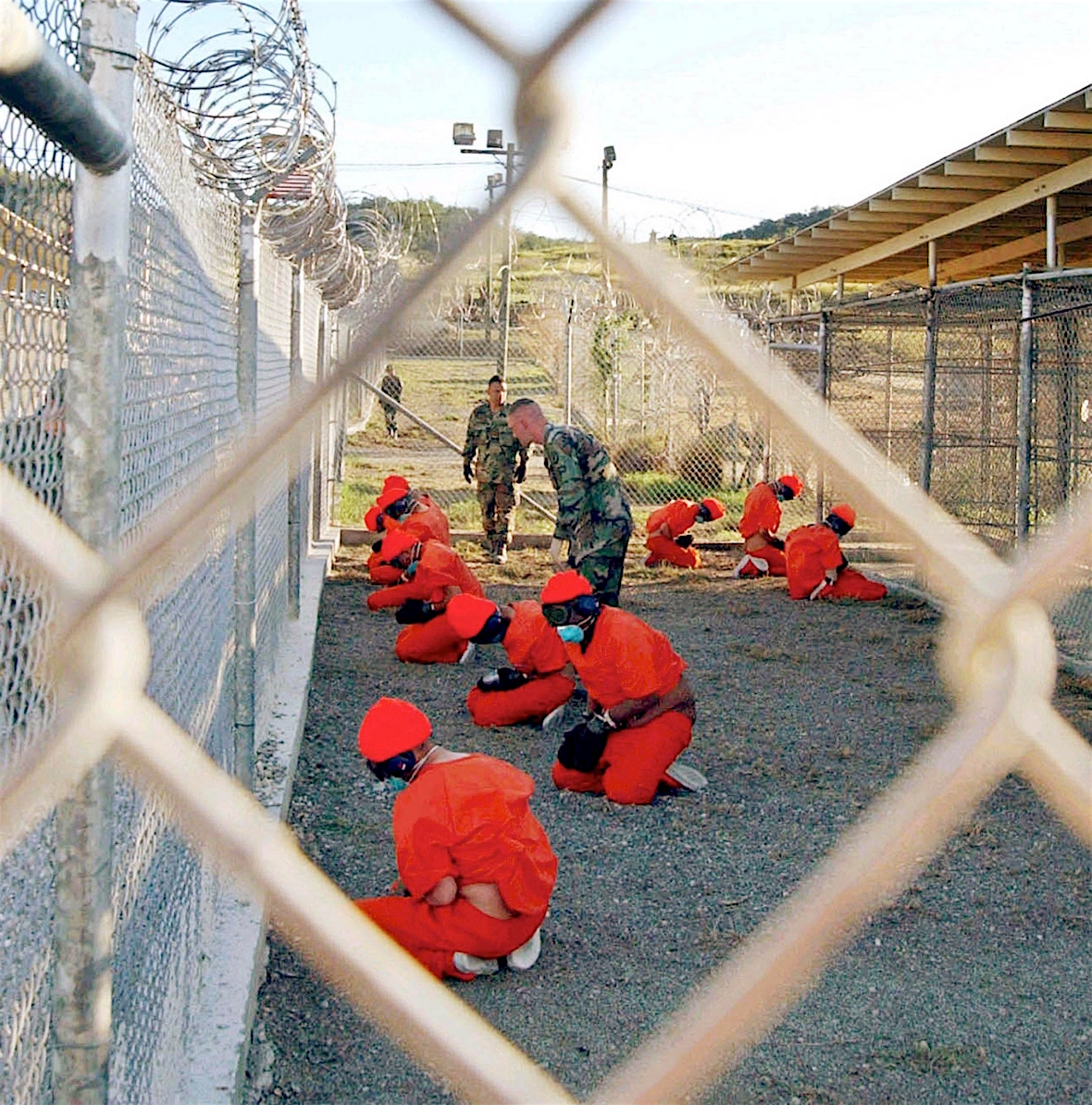One of the photos taken on the day Guantanamo opened, January 11, 2002, by Shane T. McCoy of the US Navy.