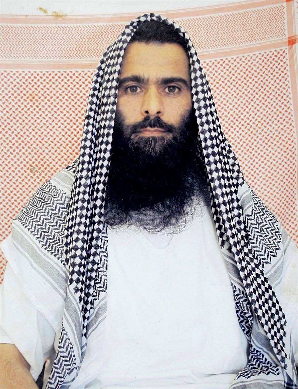 Mohammad Rahim, an Afghan prisoner at Guantanamo, regarded as a "high-value detainee," in photo taken by representatives of the International Committee of the Red Cross, who made it available to his family, who, in turn, made it publicly available.