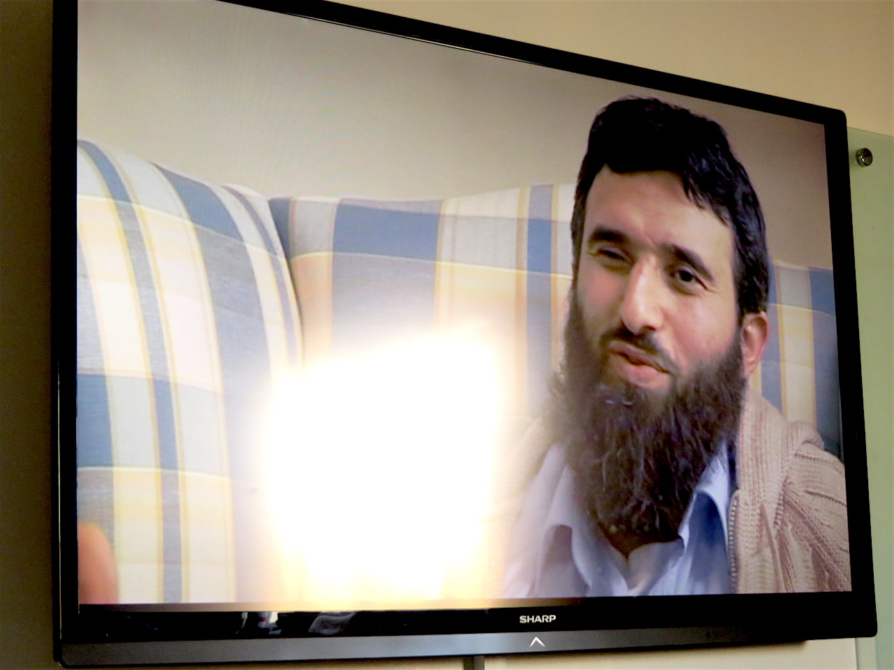A screenshot of former Guantanamo prisoner Omar Deghayes in 'Outside the Law: Stories from Guantanamo', shown at the University of Westminster on November 17, 2017 (Photo: Andy Worthington).