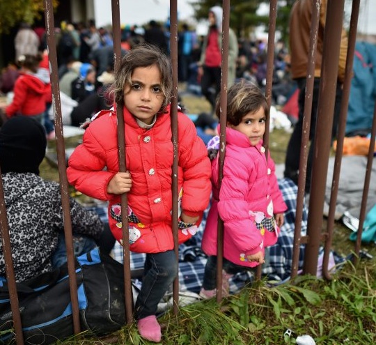 Refugee children in Slovenia, photographed on October 22, 2015 (Photo: Jeff J Mitchell/Getty Images).