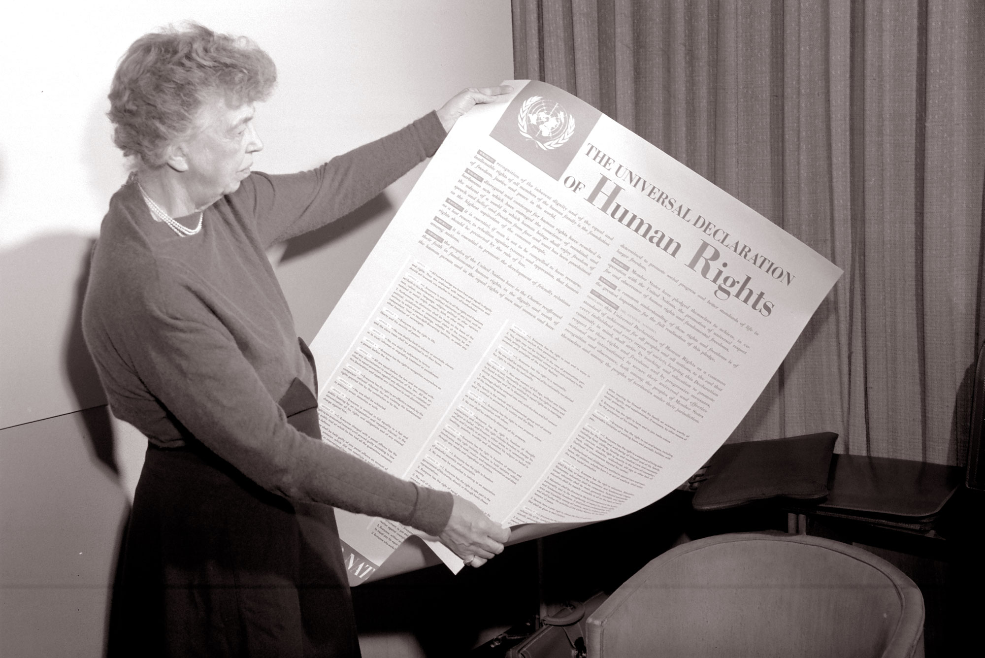 Eleanor Roosevelt holds up a copy of the Universal Declaration of Human Rights in 1948. Roosevelt, the wife of the former US president, who had a deep interest in the rights of refugees, was chosen to chair the UN Human Rights Commission, when it was established on February 16, 1946 to draft a Declaration of Human Rights.