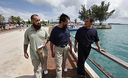 Khalil Mamut (right) and Ablikim Turahun (left) enjoy their freedom in Bermuda with Salahidin Abdulahad (center)